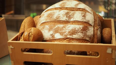 assortment of bread in a wooden crate