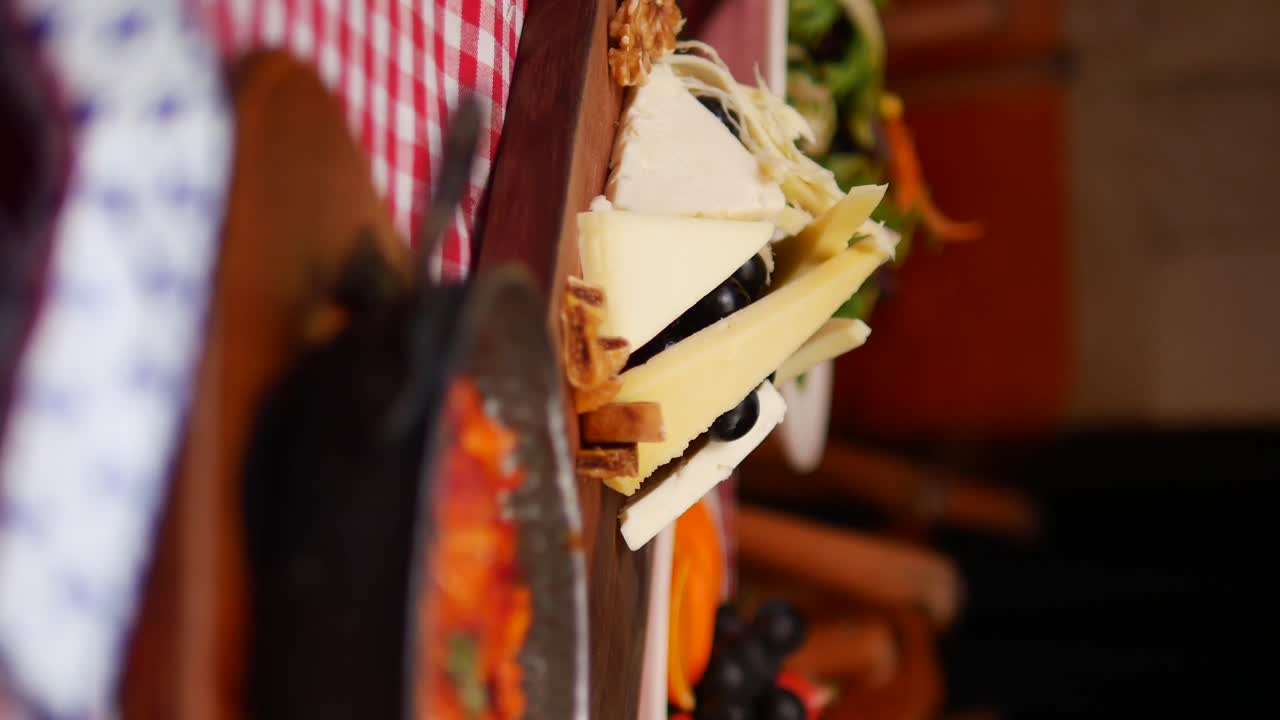 Cheese platter with grapes and nuts