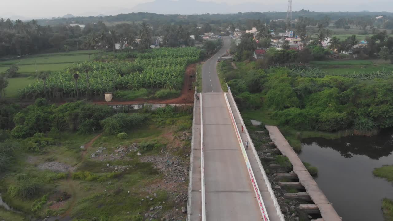 Kolamanjanur Village Bridge in the Highway Drone Hovering over the Centerline of a Highway in Rural India