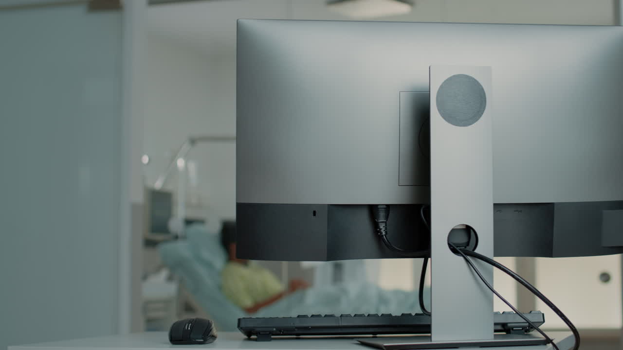 Close up of desk with computer in hospital ward clinic