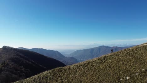hiking in the mountains is an experience where you experience emotions of anger, frustration and also joy, especially when you reach the top. a cinematographic video with a drone bears witness