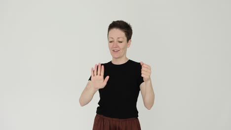 Woman in black shirt and brown pants