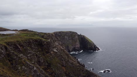 drone footage of the slieve league cliffs on coast of ireland on an overcast day