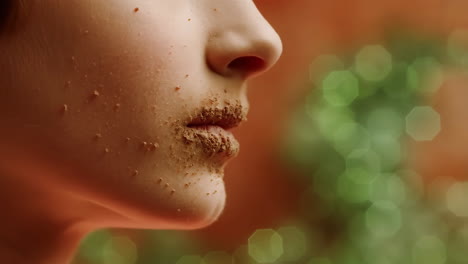 close-up of a child's face with dirt around their mouth