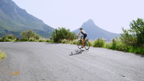 senior cyclist cycling on a road 4k