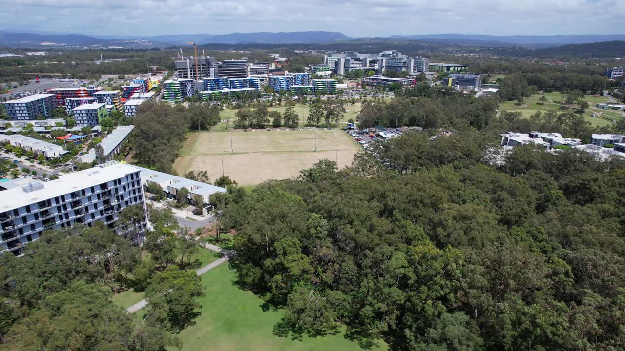 Musgrave Sports Park With Open Fields And Trees In Southport, Queensland, Australia. Aerial Drone Shot