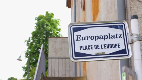 a sign in the village of schengen, where the eponymous agreement was signed ending border controls.