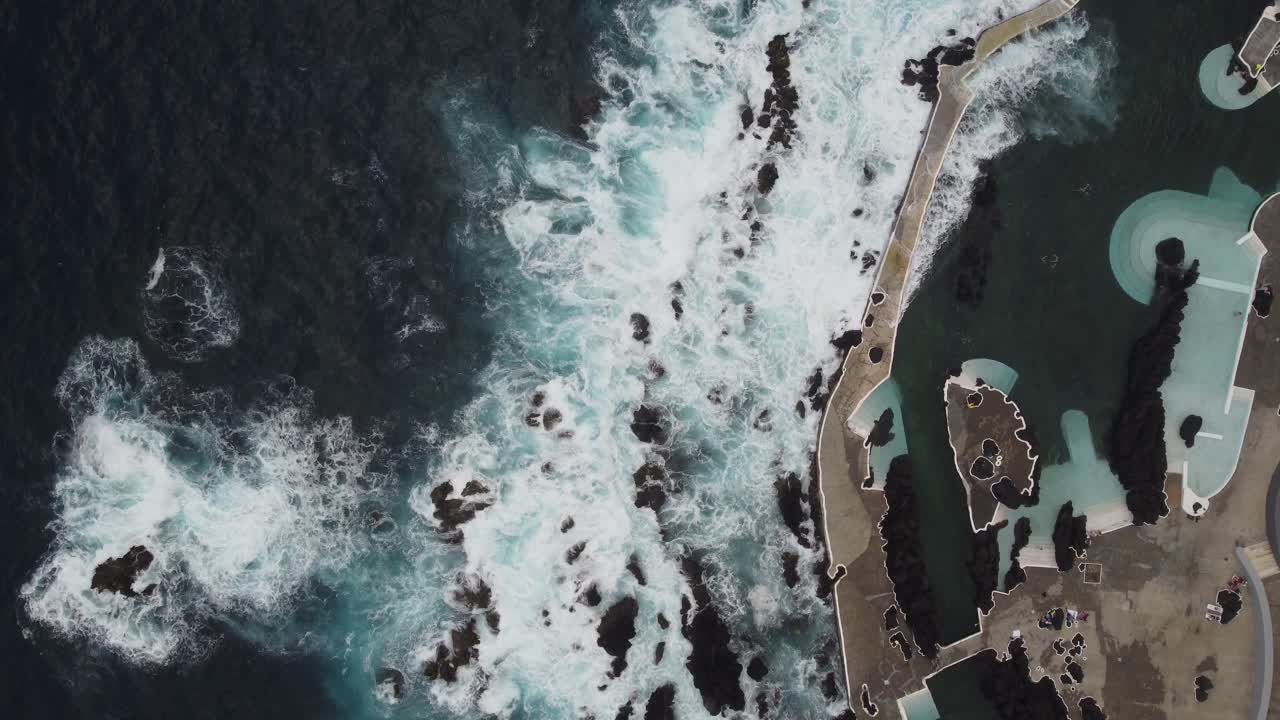 A top down view of the rough waves in Porto Moniz, Madeira