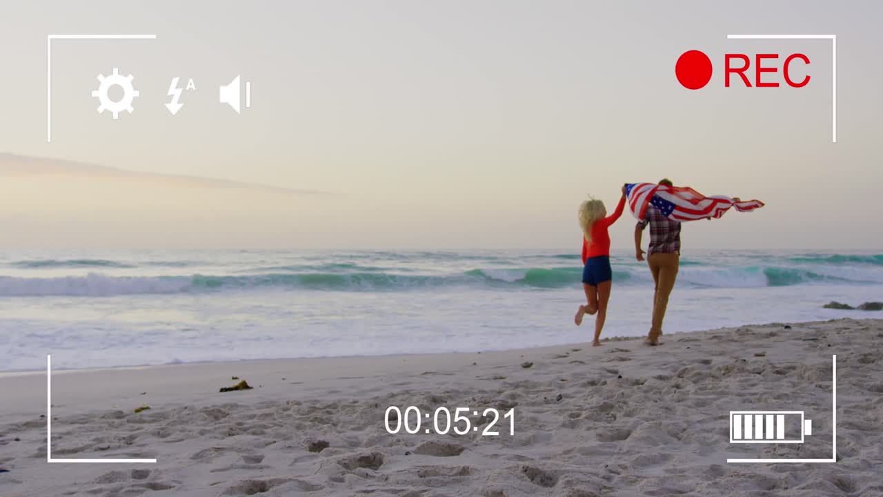 Filming a couple on a beach on a digital camera 4k
