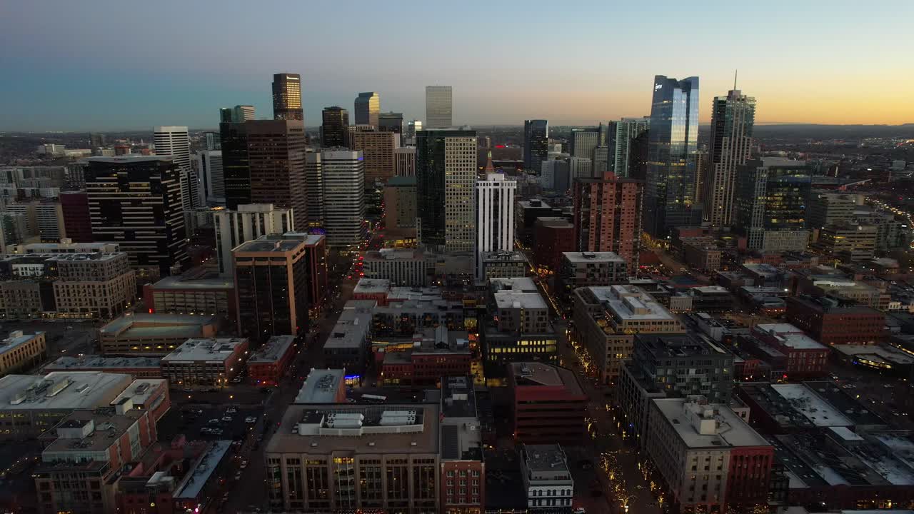 Aerial over the Denver skyline at dusk, Colorado, USA