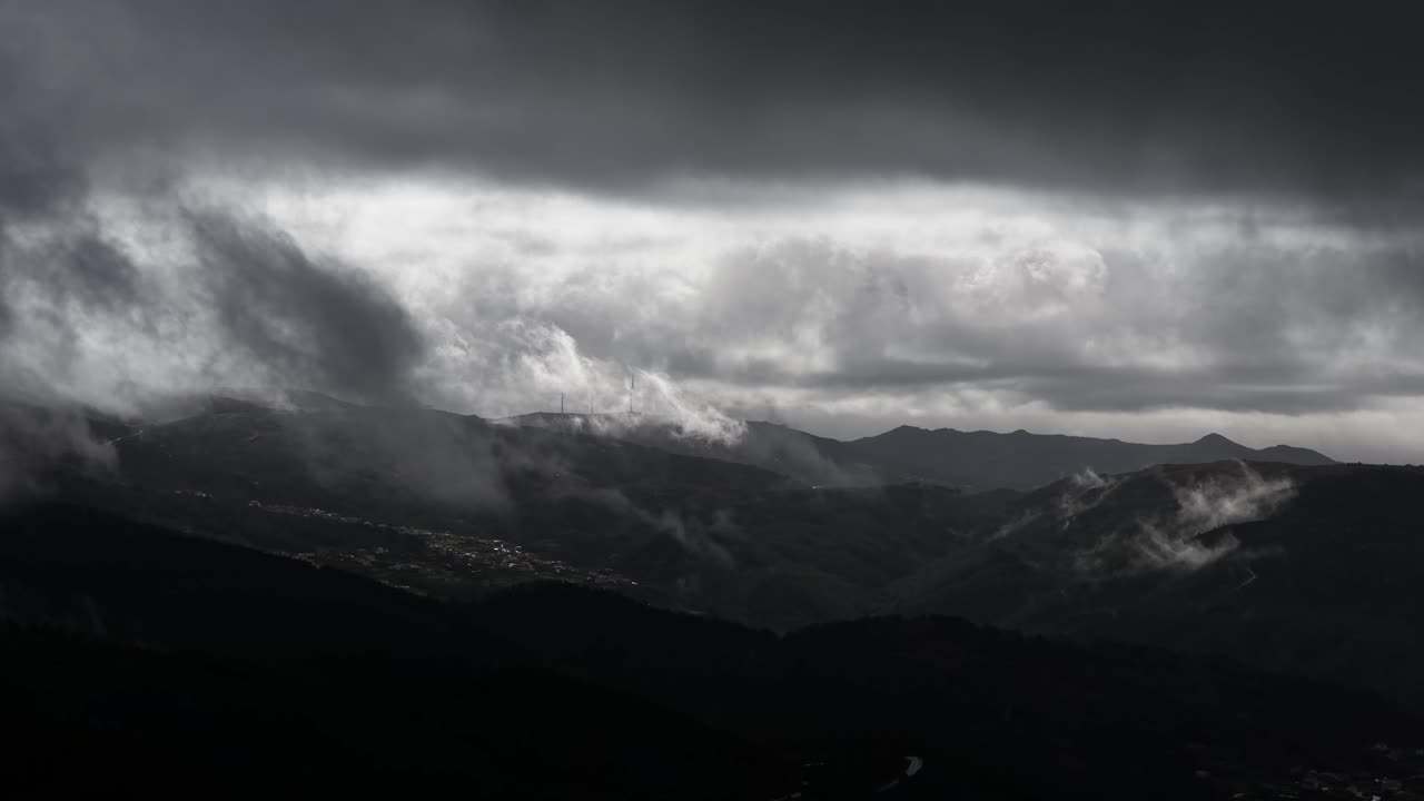 Fast moving clouds on a stormy day in Portugal mountains