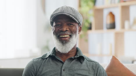 smiling senior man in living room