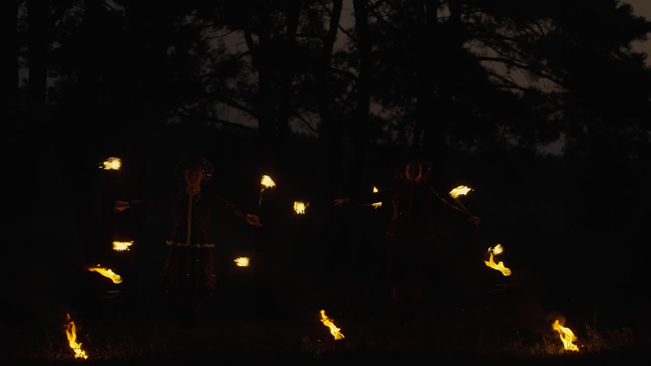 Fire Jugglers in a Dark Forest
