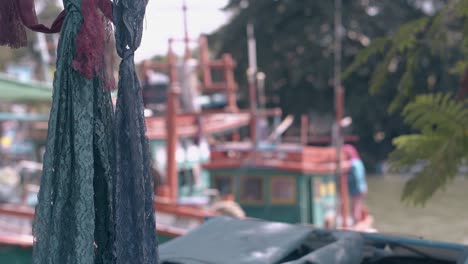 wind-waves-lacy-scarfs-and-bay-with-boats-in-background