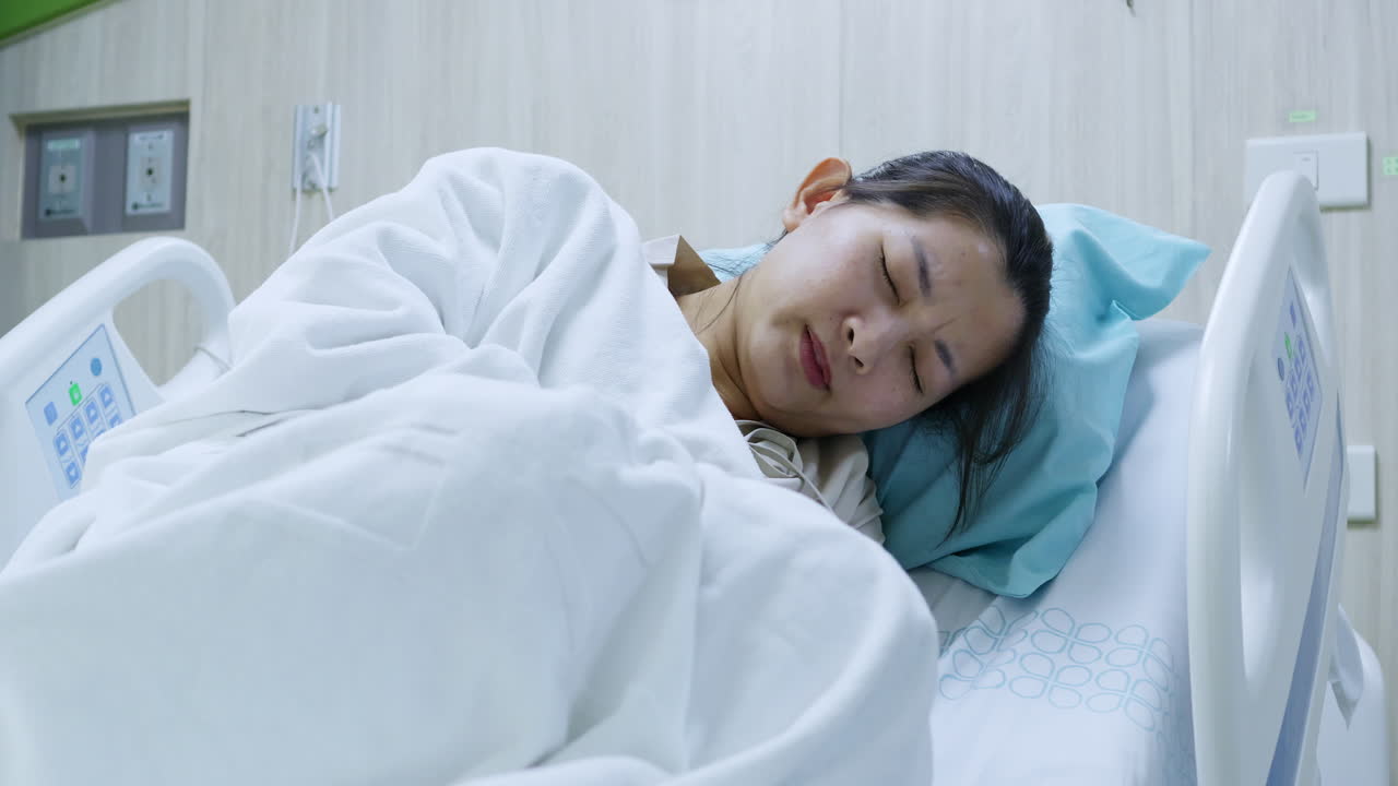 A patient rests peacefully showcasing resilience and hope in a serene hospital environment