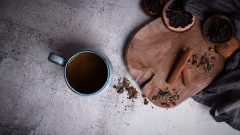 timelapse steaming hot tea in cup on grey background