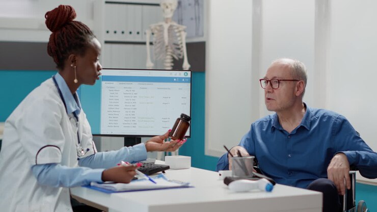 Doctor and patient discussing medicine in a clinic