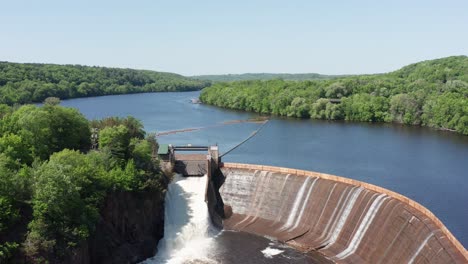 Aerial-descending-close-up-shot-of-the-Saint-Croix-Falls-Hydro-Electric-Dam-in-Wisconsin