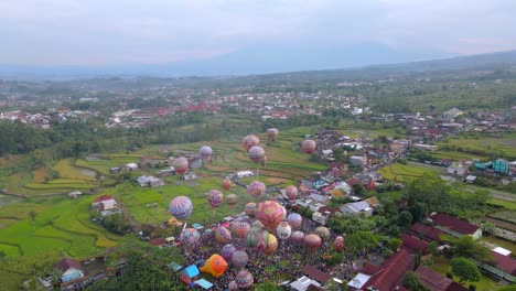 aerial view of colorful air balloon flying in the air