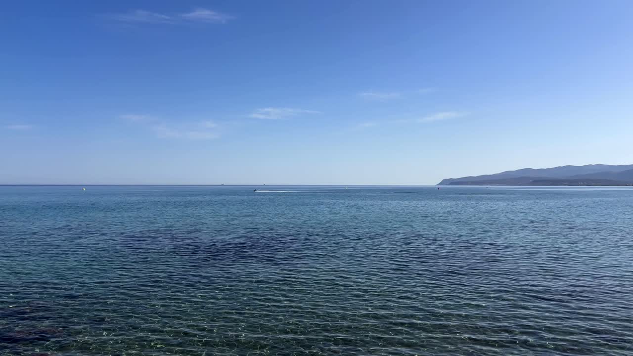 Close up of calm sea horizon in crete greece serene