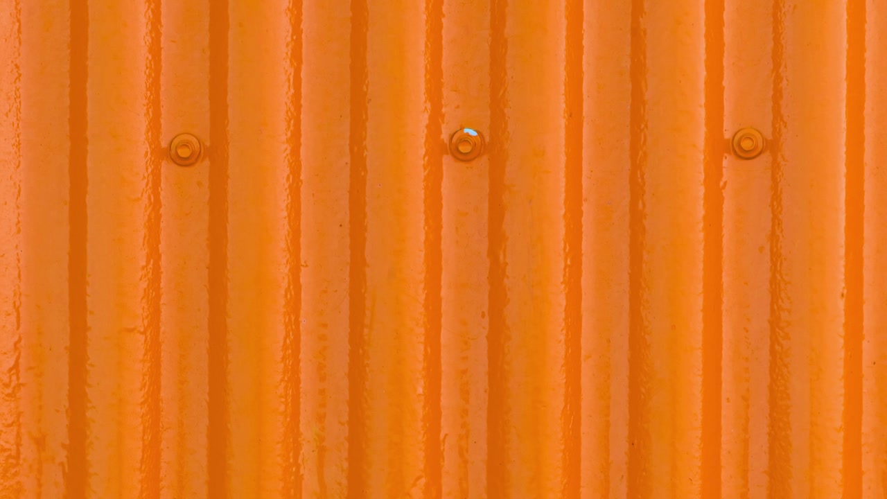 Corrugated orange metal texture background