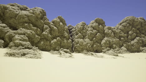 rocky formations and desert landscape under clear blue sky in remote location