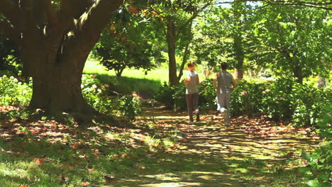 couple running in a wood