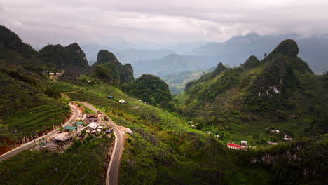 winding road through mountain villages over ha giang loop, ha giang province, vietnam, asia