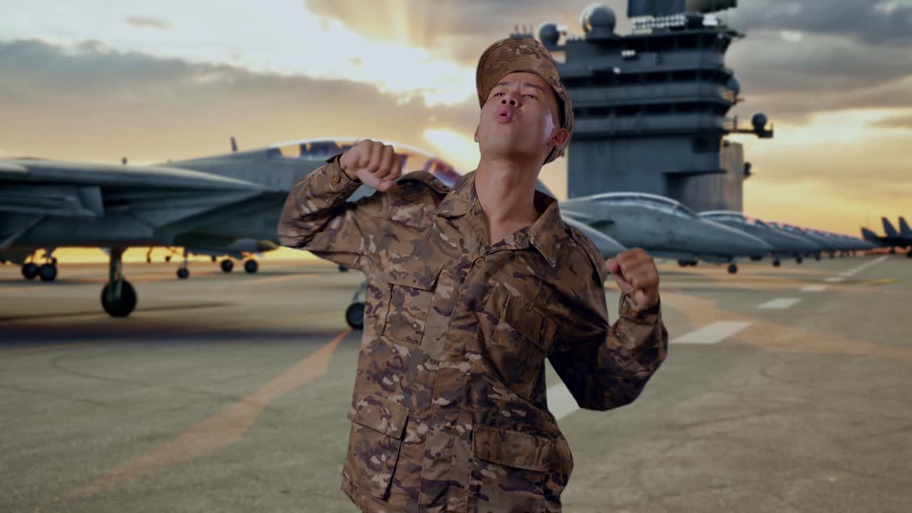 Military Personnel Celebrating on Aircraft Carrier Deck