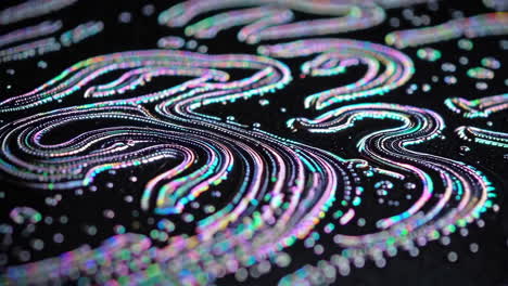 iridescent soap bubble patterns on dark background