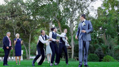 garter toss by happy groom and groomsmen catch it 4k 4k