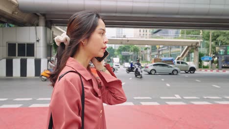 woman talking on the phone in the city