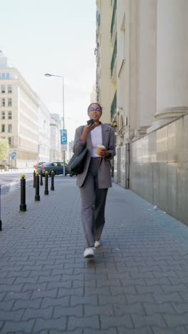 businesswoman walking in city