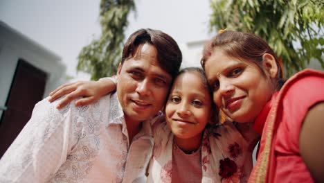 young parents with daughter celebrate decorate for diwali festival