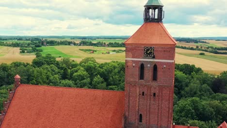 drone view on clock tower by the renovated, historic church