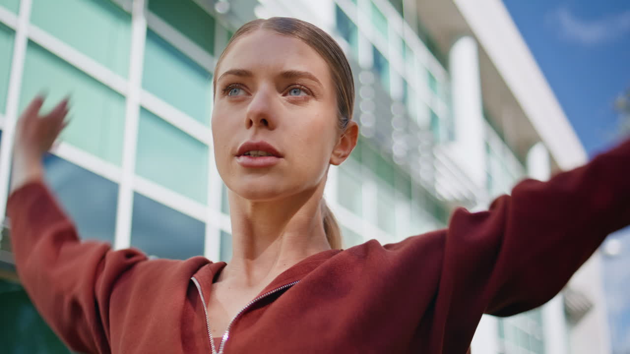 Fitness girl preparing training warming up in morning. Closeup motivated athlete