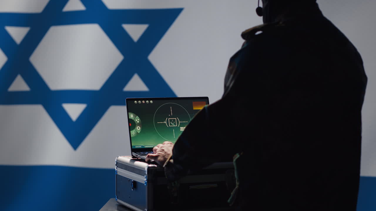 Israel Defense Forces dispatcher looking at surveillance transmission