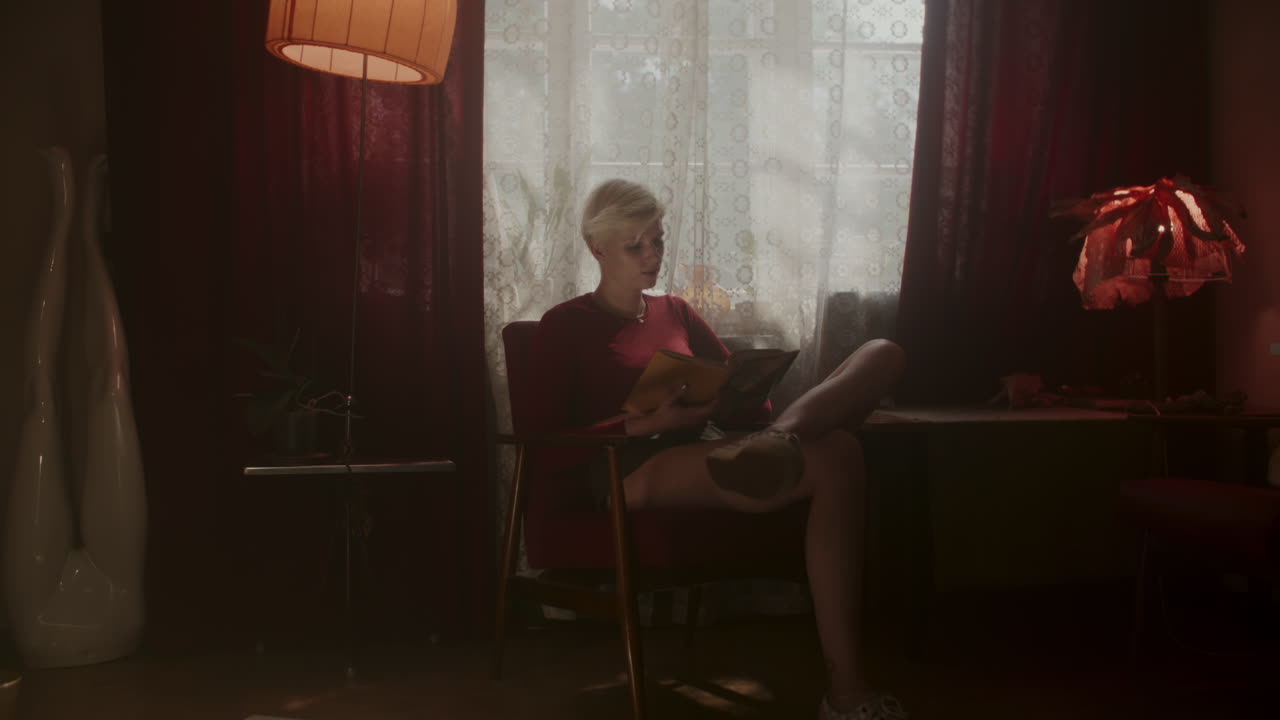 Woman Reading in Retro Interior