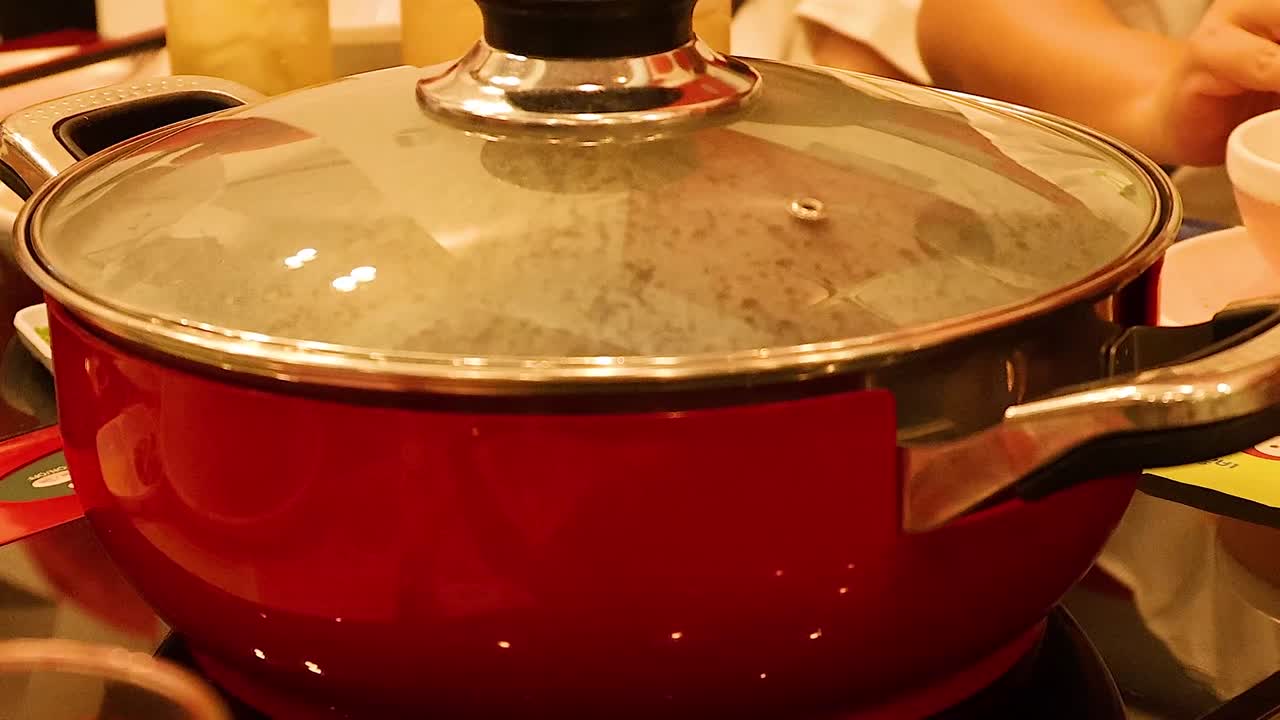 Friends enjoying a meal together in Bangkok