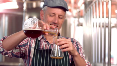 brewery worker checking the product