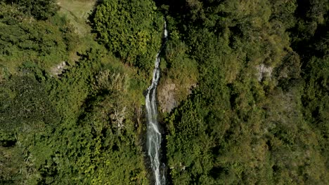 Drone-Shot-Of-The-Scenic-Cascada-de-la-Virgen,-A-Tourist-Attraction-In-Baños-de-Agua-Santa,-Ecuador