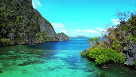 northern palawan kayangan lake tour boat ascend with view of coron