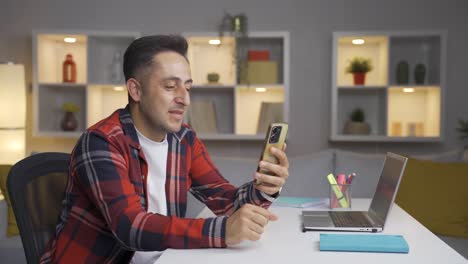 Man-in-love-video-call-on-the-phone.