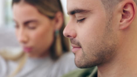 praying, man and woman on sofa for faith