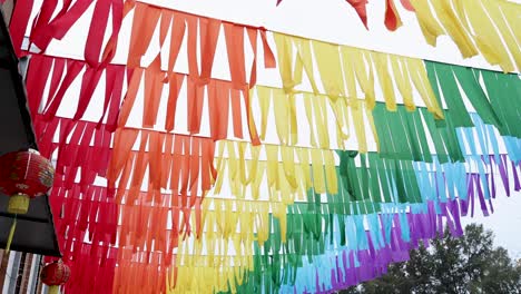 vibrant flags fluttering in krabi, thailand