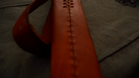 close-up of a leather sword sheath with chainmail