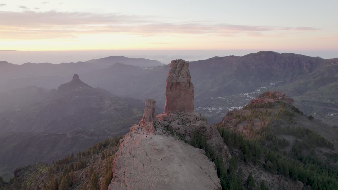 Panoramic view of the volcanic rock Roque Nublo on the island of Gran Canaria at sunset.
