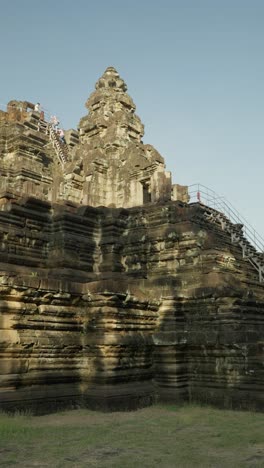 breathtaking vertical view of bayon temple from outside, the mesmerizing centerpiece of angkor thom, cambodia.
