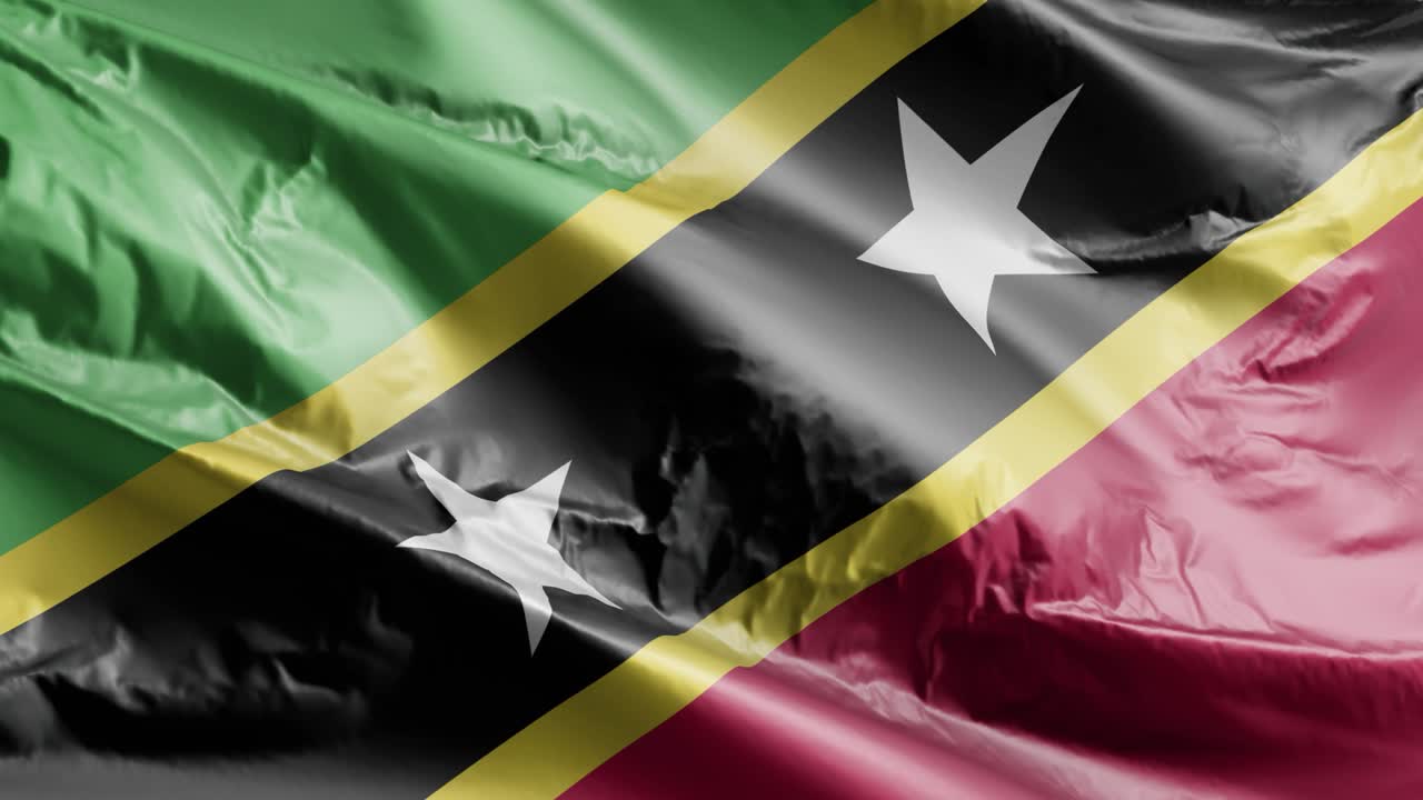 la bandera de saint kitts y nevis ondeando en el bucle del viento. la bandera de saint kitts y nevis balanceándose en la brisa. fondo de relleno completo. bucle de 10 segundos.