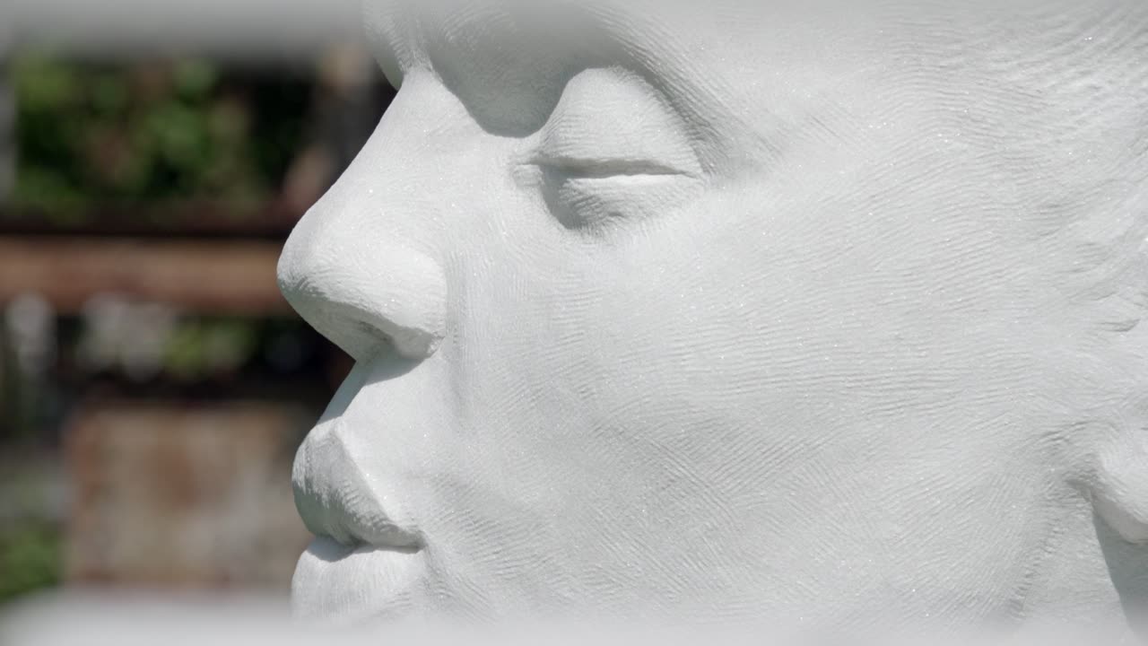 Profile of a face made of white marble at Lasa Marmo, Laas - Lasa, South Tyrol, Italy